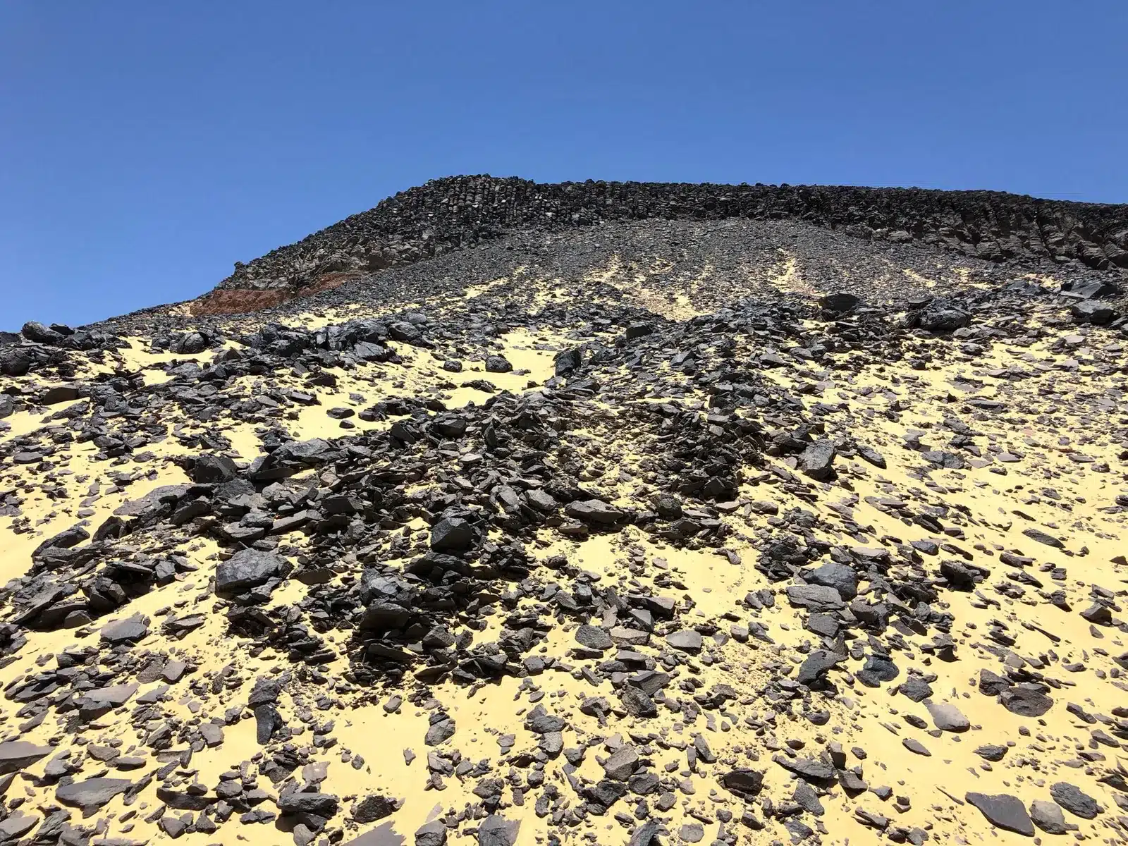 Black and White Desert Egypt tour through dark volcanic hills