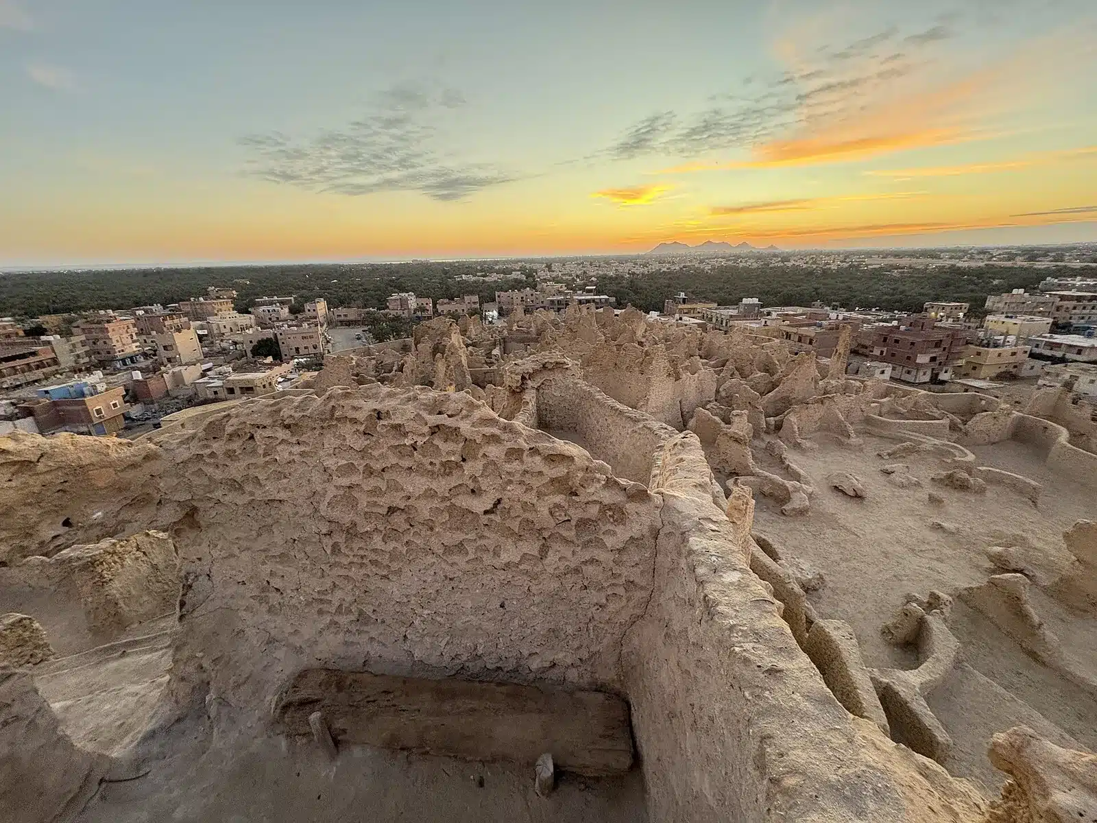 Shali Fortress Siwa ruins at sunset above the oasis