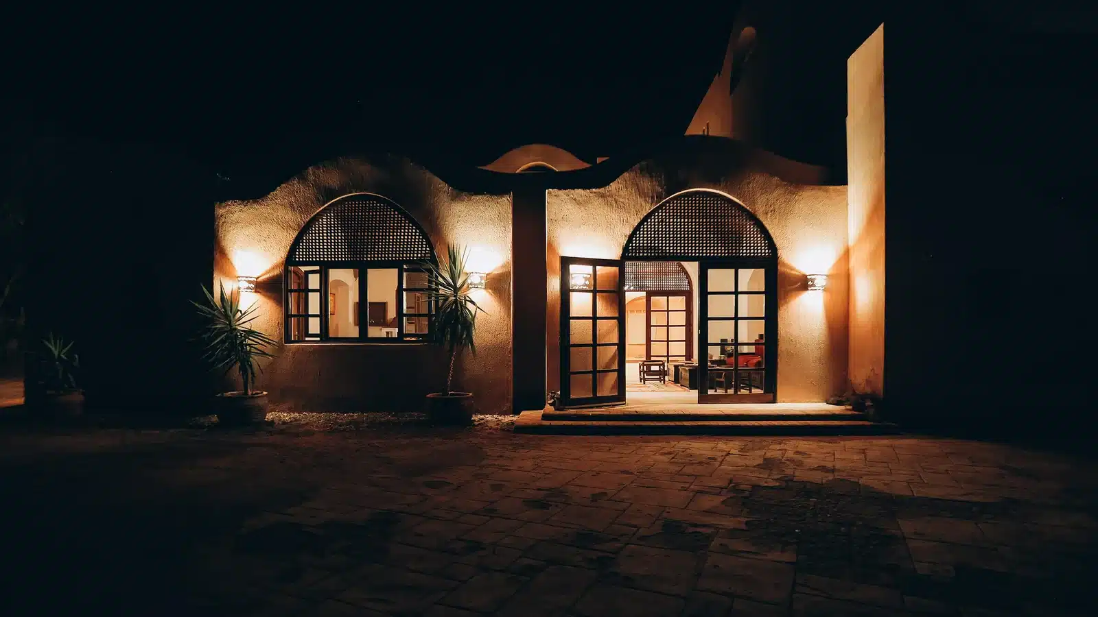 Tzila Bahariya hotel exterior at night