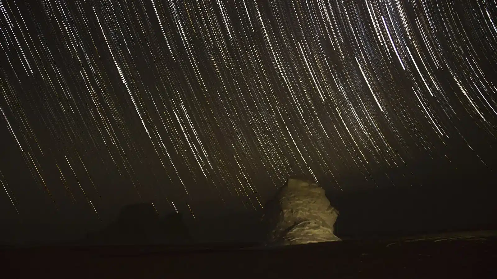 White Desert camping under a dark Egyptian desert sky