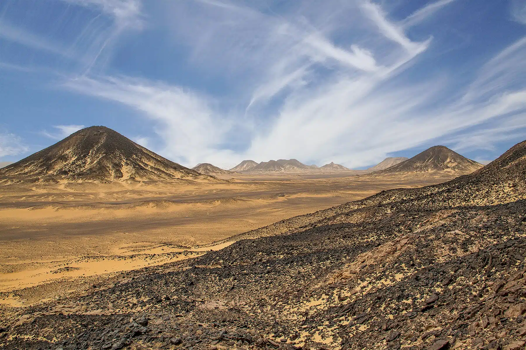 Black volcanic hills of the Black Desert near Bahariya Oasis in Egypt