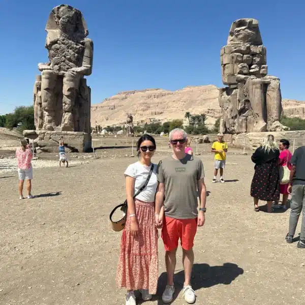 Travelers at the Colossi of Memnon during a private Luxor tour
