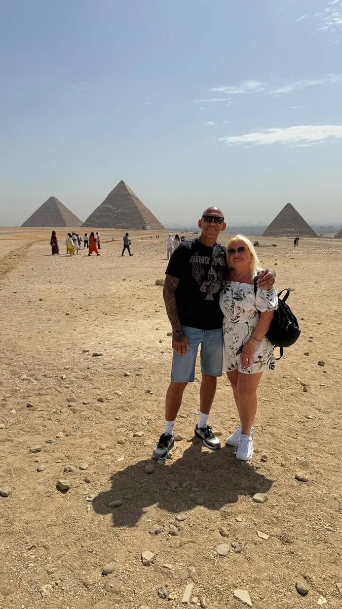 Morning Visit to the Giza Pyramids Travelers visiting the Giza Pyramids in the morning