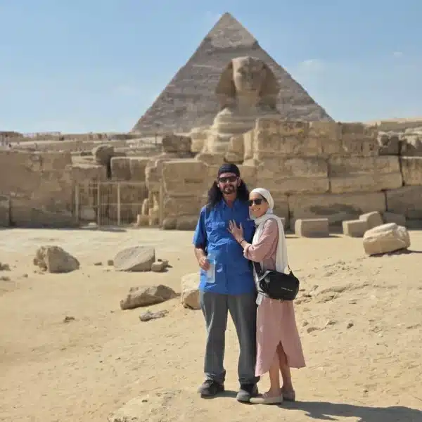 Travelers beside the Great Sphinx during a private Giza tour
