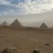 Panoramic view of the three Giza Pyramids on a private Giza Pyramids Grand Egyptian Museum tour