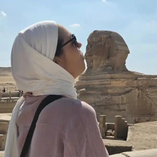 Traveler viewing the Great Sphinx at close range