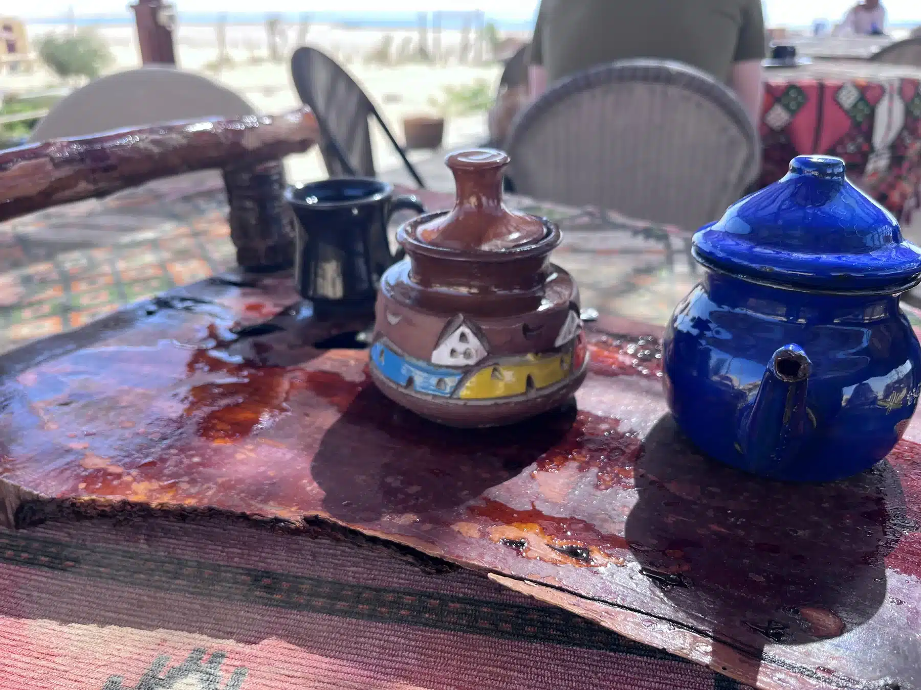 Colorful Bedouin tea pots prepared for a Fayoum desert meal