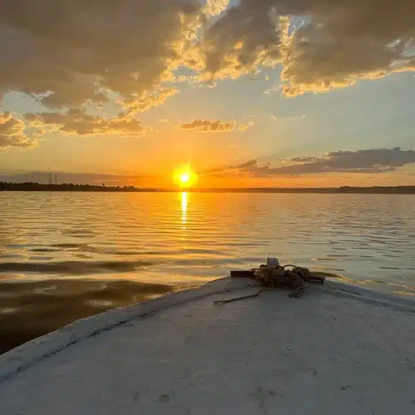 Golden sunset over a lake in Fayoum during an Egypt Christmas escape