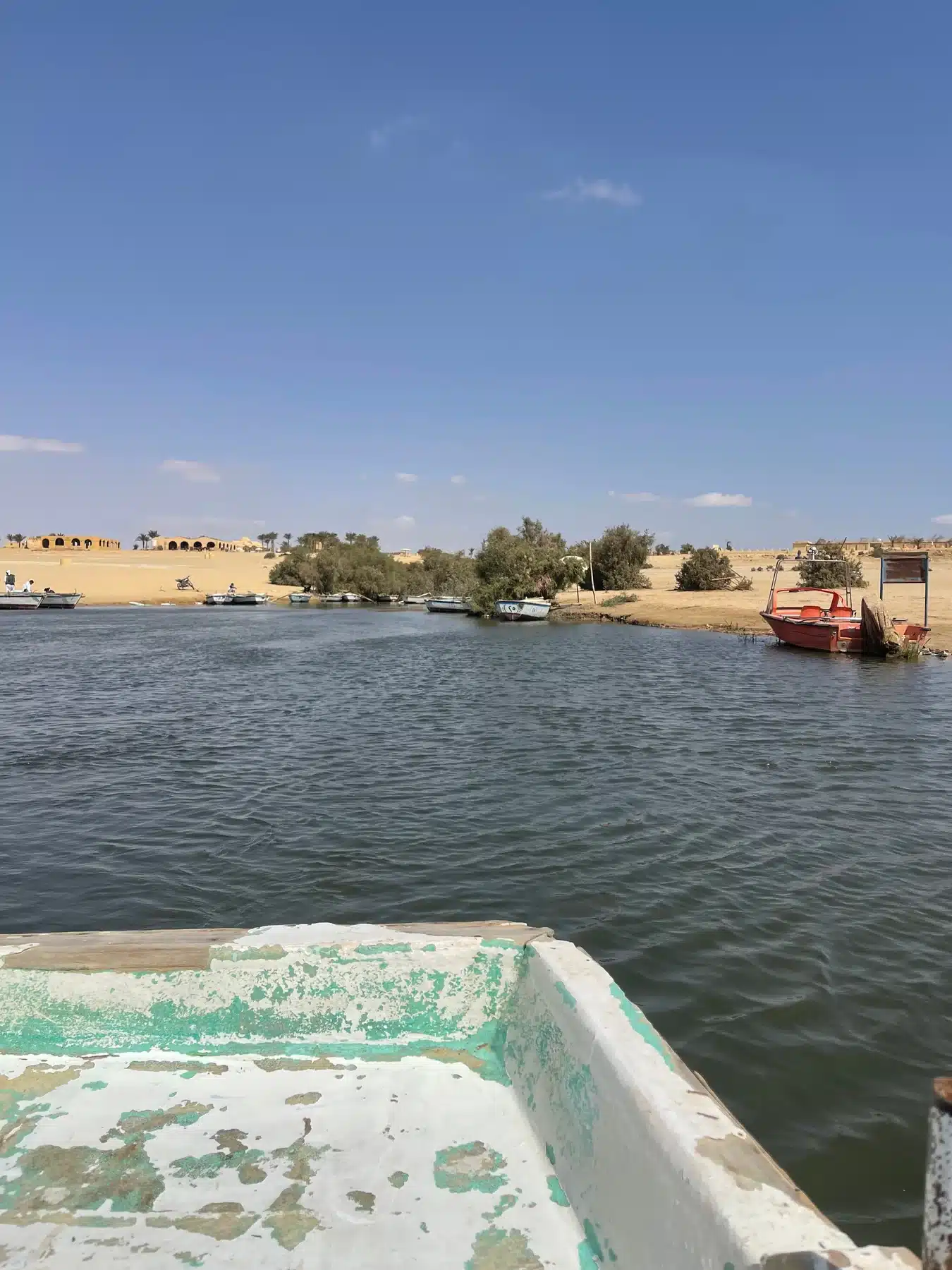 Calm lake landscape with desert shore in Fayoum Egypt