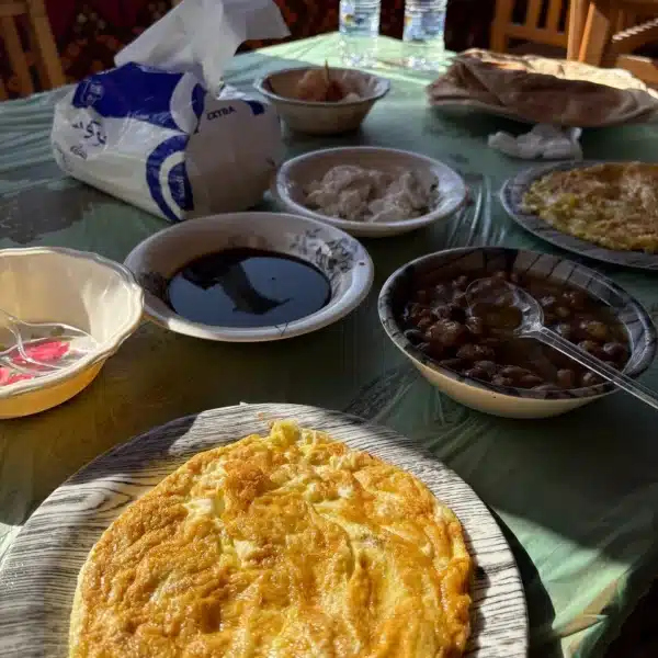 Traditional Siwan breakfast with eggs bread dates and local dishes