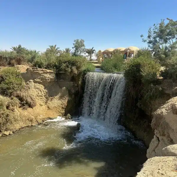 Wadi El-Rayan waterfall surrounded by the Fayoum desert landscape